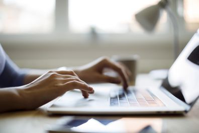 Woman using her laptop for working from home