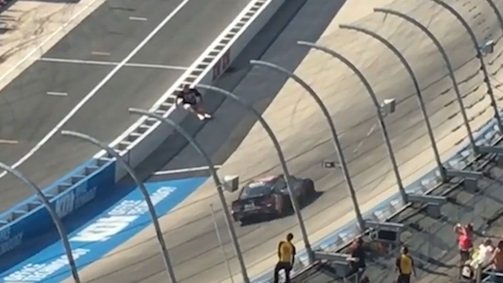 NASCAR fan risks his life to get closer to the action