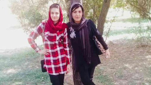 Melbourne woman Rana Haydari, pictured with her youngest sister Diana, during a trip home to Afghanistan in 2017.