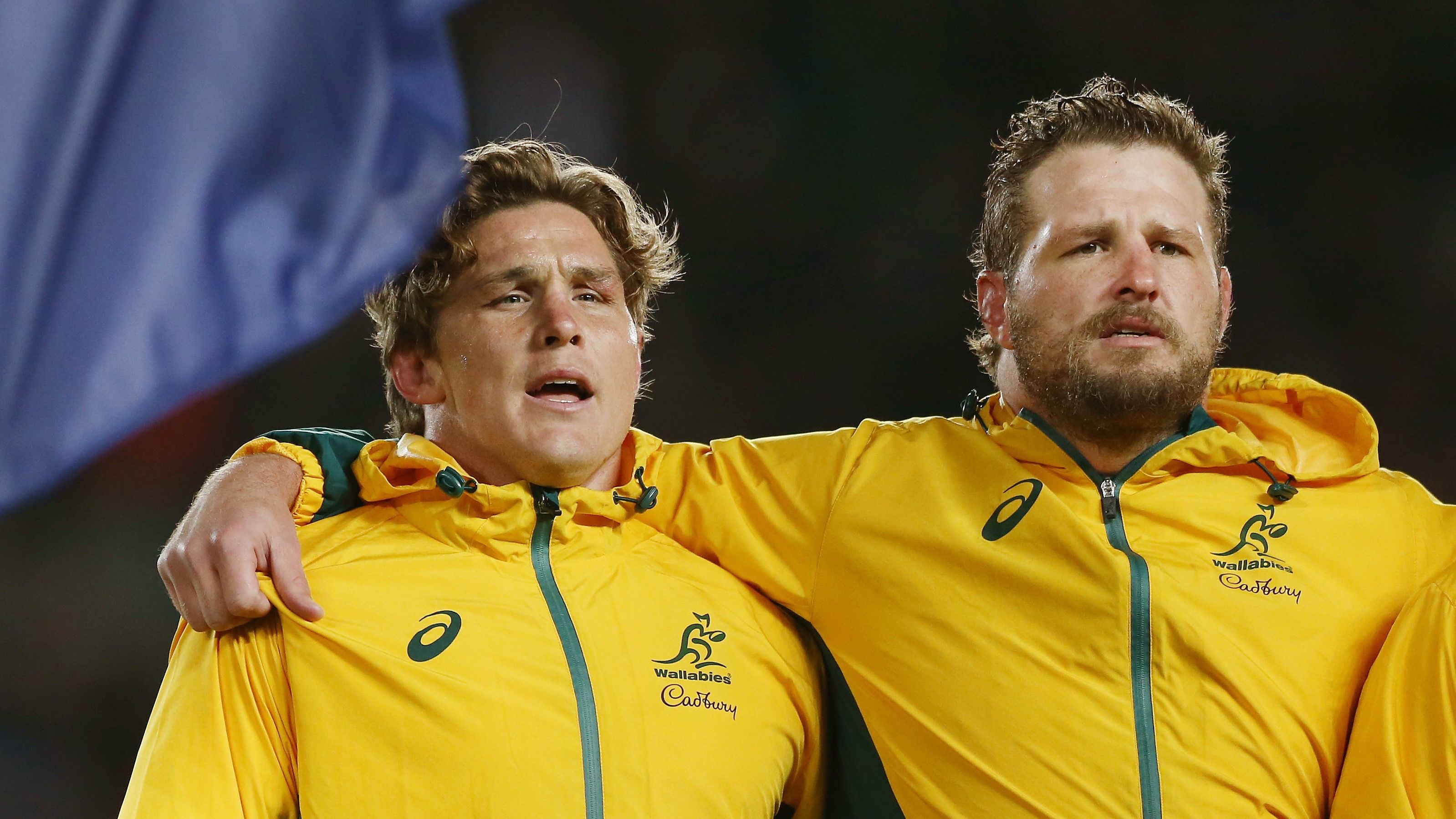 Michael Hooper (left) and James Slipper of the Wallabies sing the national anthem.
