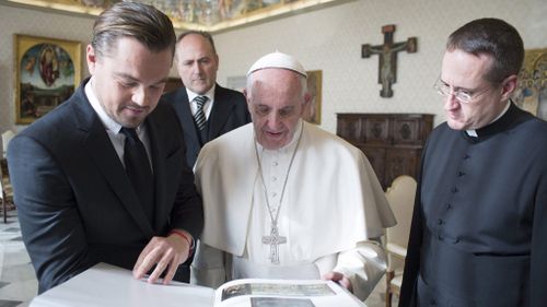 He showed the Pope a book with the works completed by 15th-century Dutch painter Hieronymus Bosch. (AAP)