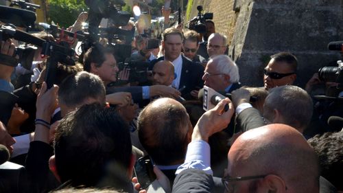Bernie Sanders mobbed by media outside the Vatican. (AFP)