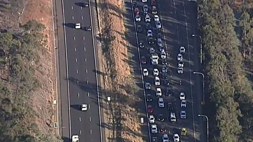 There were queues of up to 11km this morning when the truck crashed into the overpass at Colyton on the M4. Picture: 9NEWS