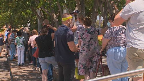 There were long queues at an entry-level vaccination clinic in the Adelaide suburb of Wayville, where many were waiting for a COVID-19 booster shot.