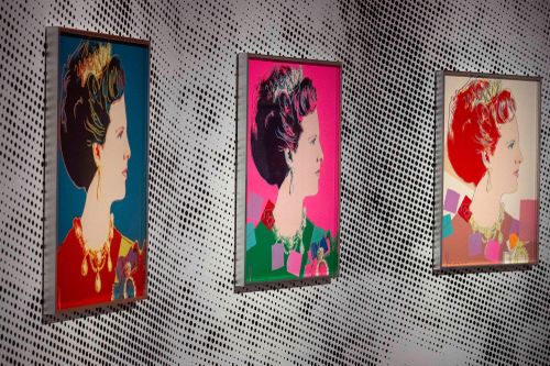Screen prints depicting Queen Margrethe II of Denmark, part of a series of sixteen prints of four queens titled Reigning Queens, 1985, by Andy Warhol at museum Paleis Het Loo in Apeldoorn, Netherlands, Wednesday, Oct. 9, 2024, similar to a Warhol work stolen from a gallery in Oisterwijk, Netherlands, early Friday, Nov. 1, 2024.