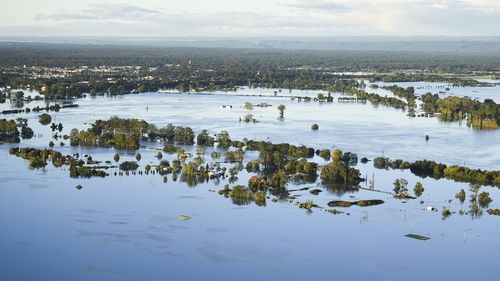 SYDNEY, AUSTRALIA - MARCH 24:  Flood affected areas are seen from a helicopter in the Windsor and Pitt Town areas along the Hawkesbury River on March 24, 2021 in Sydney, Australia. Recovery and flood clean up begins for parts of Western Sydney following days of continuous rain leading to dozens of communities declared disaster zones. (Photo by Lukas Coch - Pool/Getty Images)