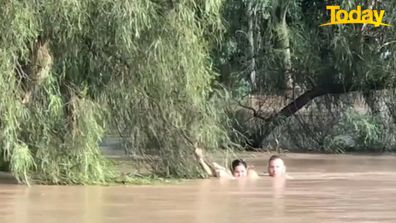 Hero cop Matt Owens helped save a young girl from raging floodwaters in Queensland's Darling Downs.