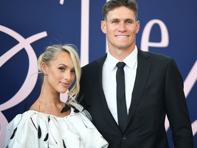 Lexi and Rory Lobb pose for a photo during the 2024 Derby Day at Flemington Racecourse on November 2, 2024 in Melbourne, Australia. 