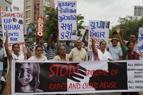 Indian activists protest against incidents of rape in shelter homes of Bihar and Uttar Pradesh, in Ahmadabad last month.
