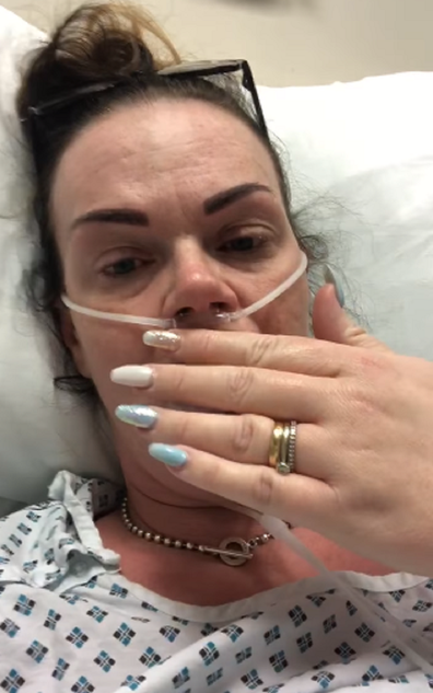 She released a video from her hospital bed, pleading with people to stay home.