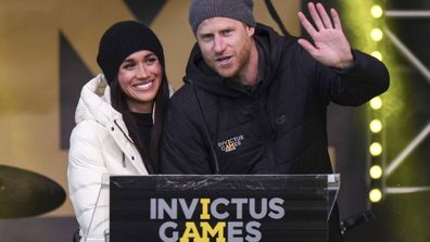 Britain's Prince Harry and his wife Meghan, the Duke and Duchess of Sussex, attend a welcome celebration during the 2025 Invictus Games, in Whistler, British Columbia, Monday, Feb. 10, 2025. (Darryl Dyck/The Canadian Press via AP)