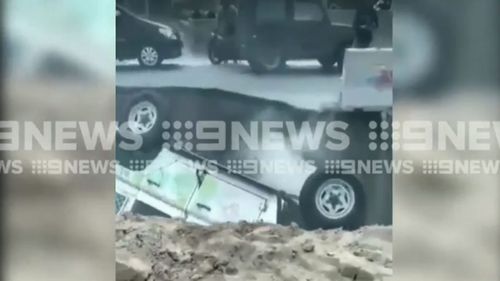 The two-metre-deep sinkhole occurred as an excavation for an underpass project was underway on the opposite side of the road.