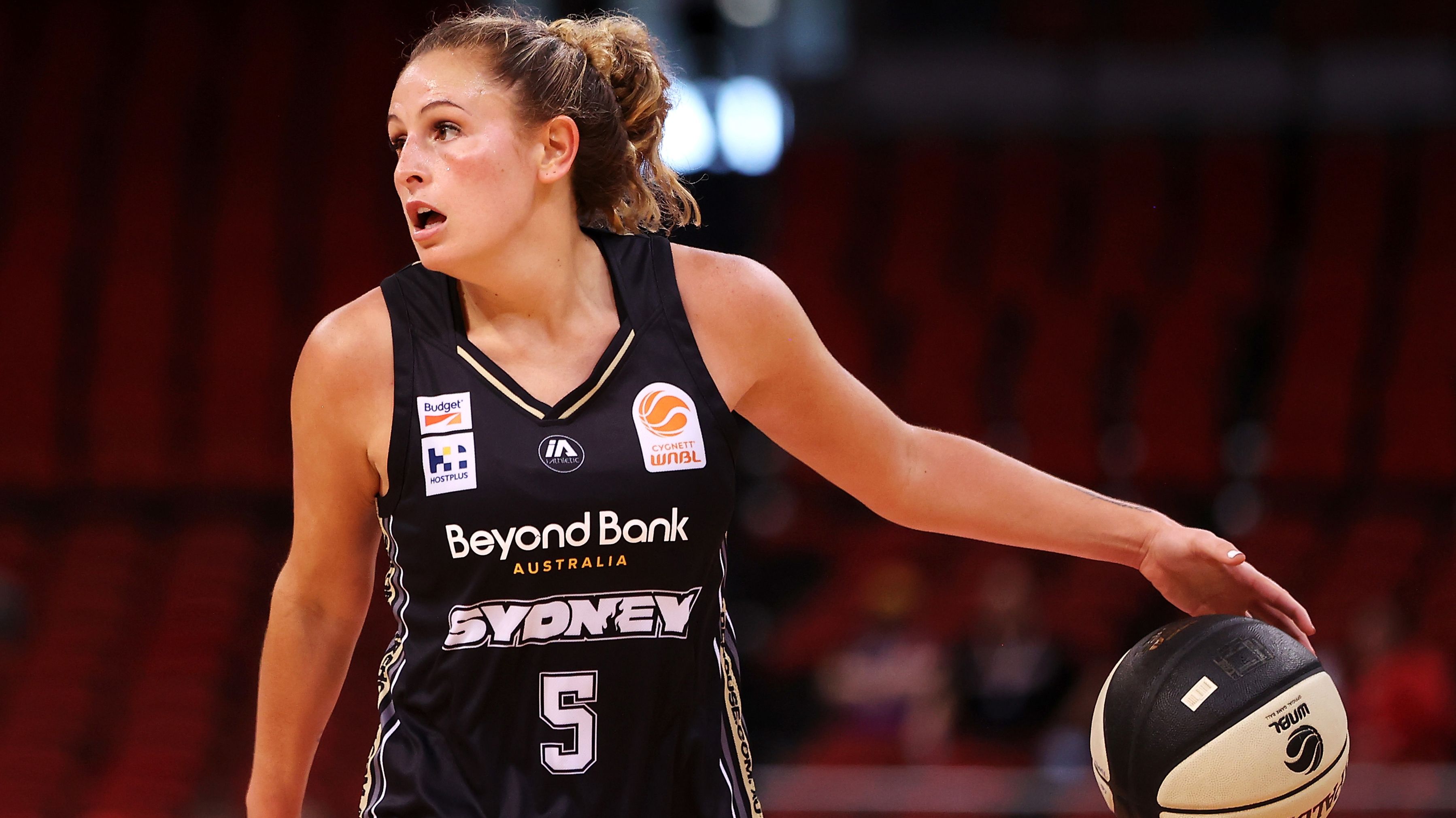 Tiana Mangakahia of the Flames controls the ball during the round 4 WNBL match between Sydney Flames and Bendigo Spirit at Qudos Bank Arena, on December 04, 2022, in Sydney, Australia. (Photo by Mark Kolbe/Getty Images)