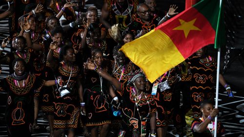 Athletes from Cameroon enter the stadium for the Opening Ceremony. (AAP)