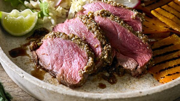 Lemon pepper crusted sirloin steak with watermelon, white bean and onion salad