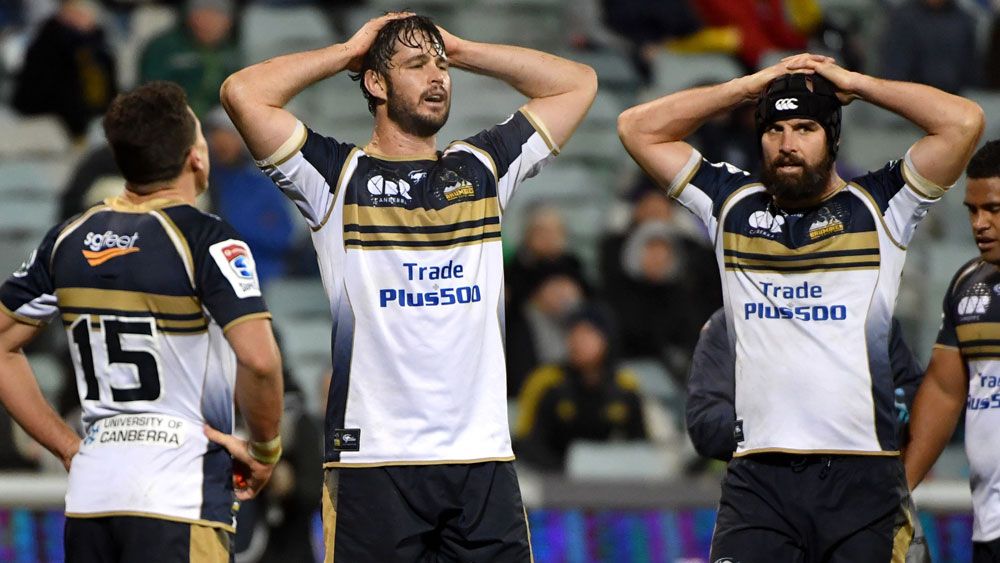 Brumbies pair Sam Carter and Scott Fardy after their team conceded a try. (AAP)