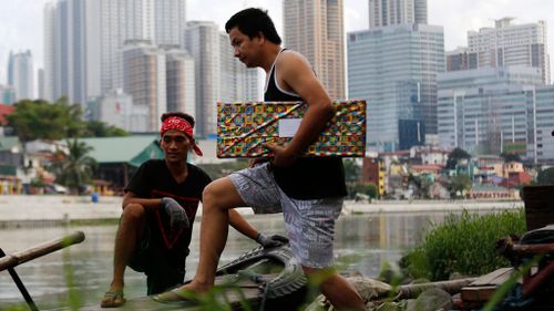 Thousands of Filipinos urged to evacuate ahead of Christmas Day typhoon