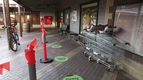 The Woolworths supermarket in Jindabyne featured social distancing markers outside so the store does not become too crowded.