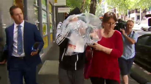 Rowan Wild leaving the Melbourne Magistrates' Court. (9NEWS)