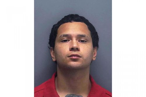 FILE - This Feb. 26, 2018 photo made available by the Lee County Sheriff's Office, Fla., shows Jose Raul Bonilla under arrest. Bonilla, who shot several people, killing one, at a zombie-themed festival in Florida more than four years ago, was sentenced on Monday, Jan. 13, 2020, to 30 years in prison. (Lee County Sheriff's Office via AP, File) (Associated Press)