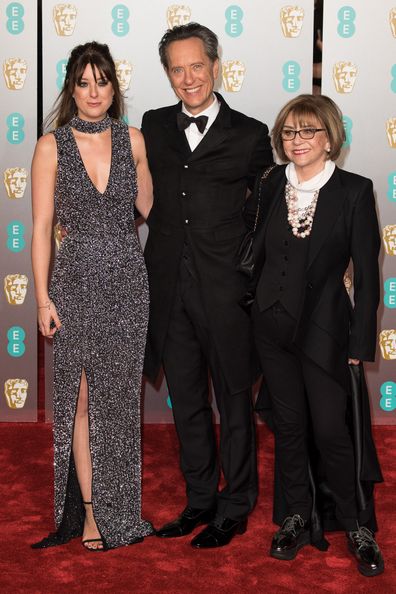 Richard E. Grant with daughter Olivia (left) and wife Joan Washington attend the EE British Academy Film Awards at Royal Albert Hall on February 10, 2019 in London, England.
