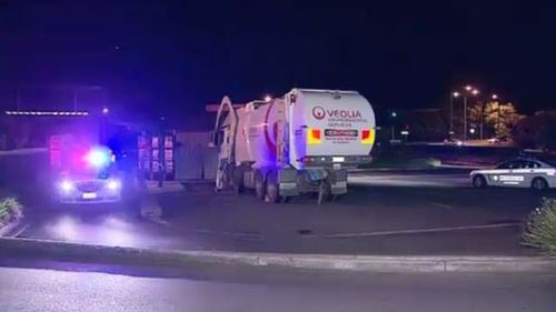 Woman fatally struck by garbage truck at Adelaide Hungry Jack’s outlet