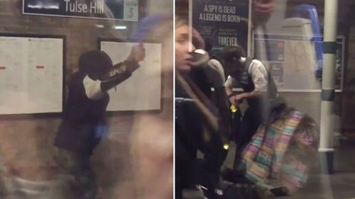 Hooded man tasered by police at a London train platform after reportedly waving a machete at commuters during peak hour.