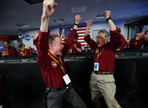 Jubilation at NASA after InSight touches down on Mars.