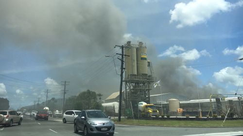 Plumes of smoke are seen billowing across Cairns. (9NEWS)