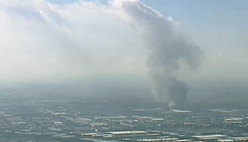 Large plumes of smoke are issuing from the blaze. (9NEWS)