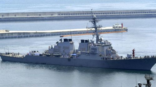 China condemns US for sending warship into disputed sea