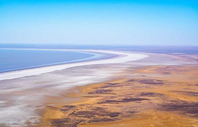 Lake Eyre's salty shoreline looks like the rings of Saturn.