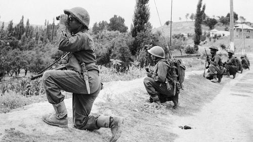 FILE - Indian troops are on the move in Kashmir against guerrilla forces during the second war over Kashmir on Sept. 6, 1965. (AP Photo, File)