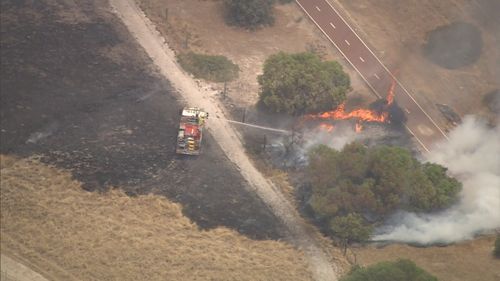 Authorities have warned flare ups are still taking place, posing a danger for fire crews.