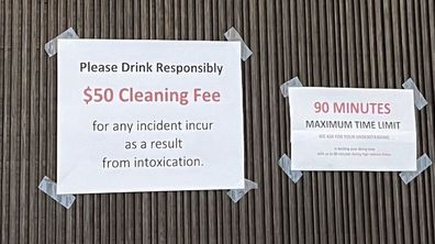 Sign charging customers $50 vomit fee in Home Plate, San Francisco