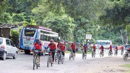 Hundreds of Buddhist nuns cycle through Himalayas to protest human trafficking 