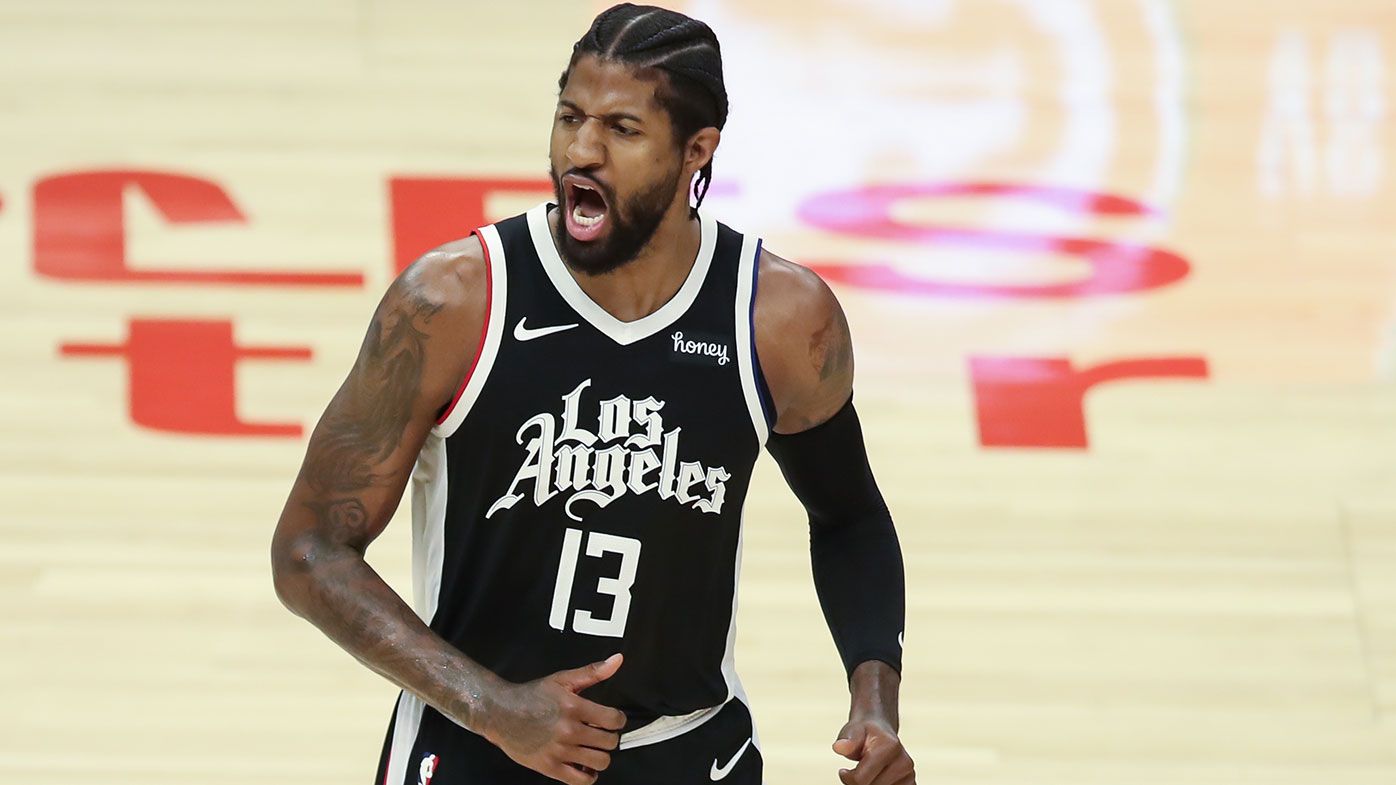 LA Clippers guard Paul George (13) yells and 1 after a basket during the Phoenix Suns game versus the Los Angeles Clippers game 3 NBA Western Conference Finals game on June 24, 2021, at Staples Center in Los Angeles, CA. (Photo by Jevone Moore/Icon Sportswire via Getty Images)
