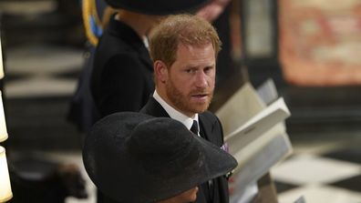 Prince William, Kate, Princess of Wales, Prince Harry and Meghan, Duchess of Sussex attend the committal service for Queen Elizabeth II at St George's Chapel.