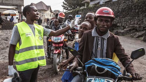 Locals in the city of Goma have their temperature checked after a case of Ebola there.