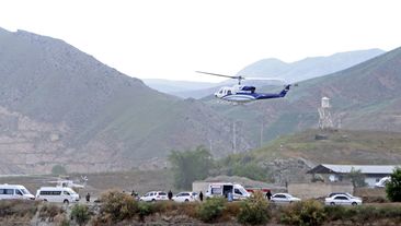 In this photo provided by Islamic Republic News Agency, IRNA, the helicopter carrying Iranian President Ebrahim Raisi takes off at the Iranian border with Azerbaijan.