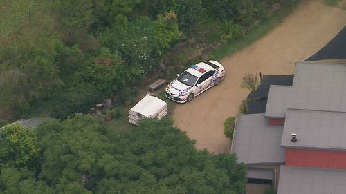 A young man who was found with critical head injuries at a property north of Brisbane had been partially buried alive