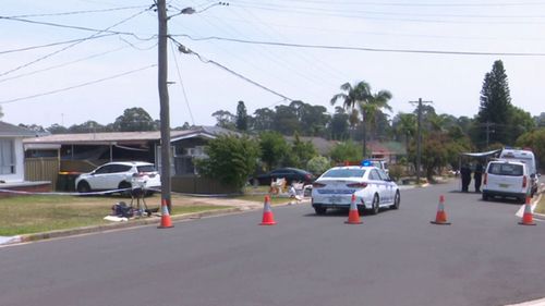 A body has been found outside a home in Mount Pritchard, Sydney.