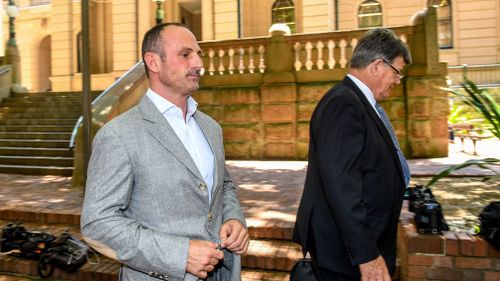 Christian Paul Warburton (left) leaves the Central Local Court in Sydney, Tuesday, November 19, 2017. (AAP)