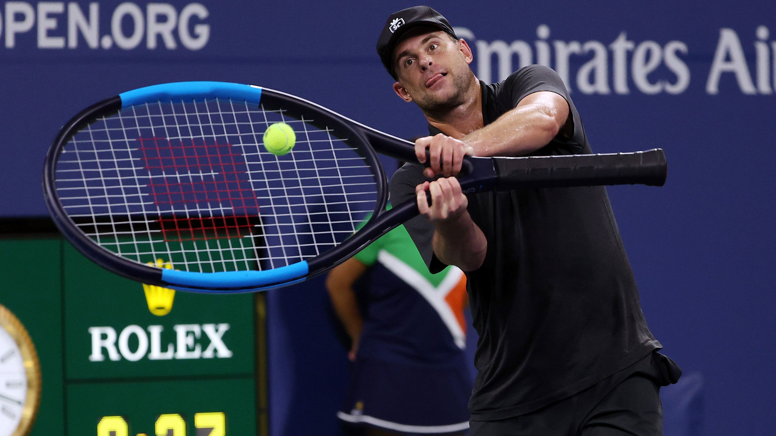 Andy Roddick uses an oversize racquet during a US Open Legends match against James Blake and Bethanie Mattek-Sands in 2022.