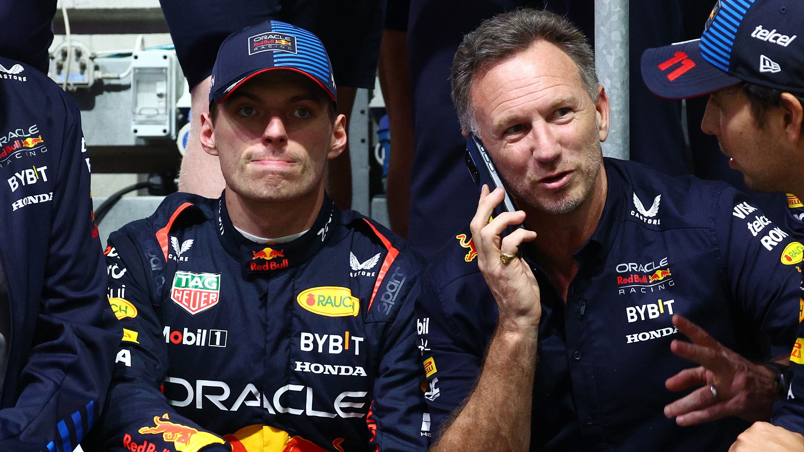 Max Verstappen (left) with Red Bull team principal Christian Horner.