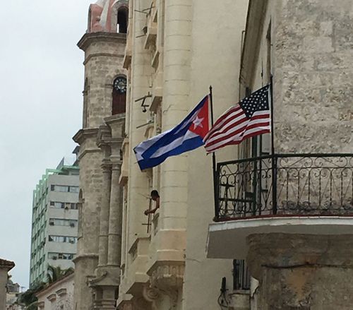 American and Cuban flags flying together. (Laura Turner)
