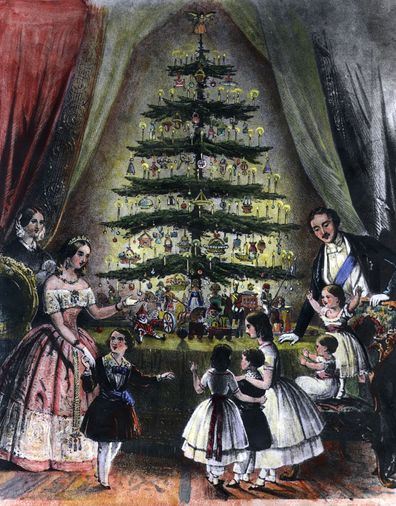  Queen Victoria and Prince Albert around the Christmas tree