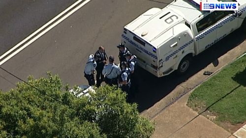 Toddler fighting for life and man charged after alleged assault in Guildford, Sydney