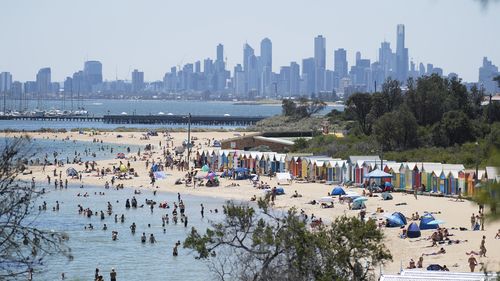 People braved the heat at Brighton Beach yesterday. (AAP)