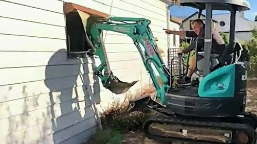 Two Queensland brothers have fronted court after demolishing a Victorian house they partially owned to prove a point to their sister.
